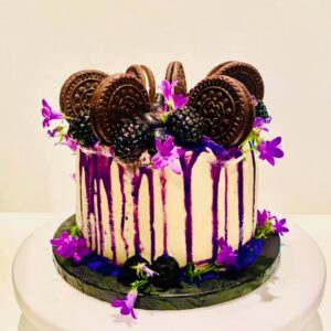Fruits topped Vanilla sponge Cake with Blackcurrant Jam and Buttercream Layers