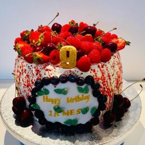 Vanilla Sponge Cake with alternative Raspberry Jam and Buttercream Layers, decorated with Fresh Seasonal Fruits
