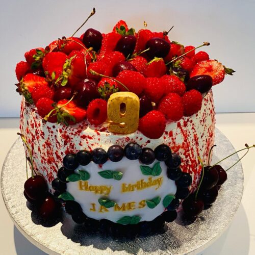 Vanilla Sponge Cake with alternative Raspberry Jam and Buttercream Layers, decorated with Fresh Seasonal Fruits