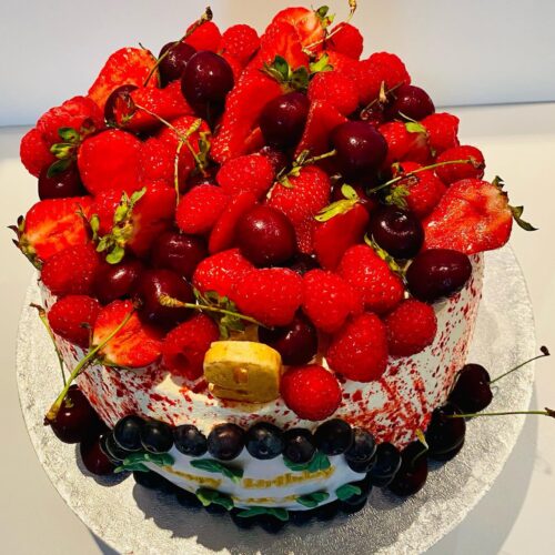 Vanilla Sponge Cake with alternative Raspberry Jam and Buttercream Layers, decorated with Fresh Seasonal Fruits