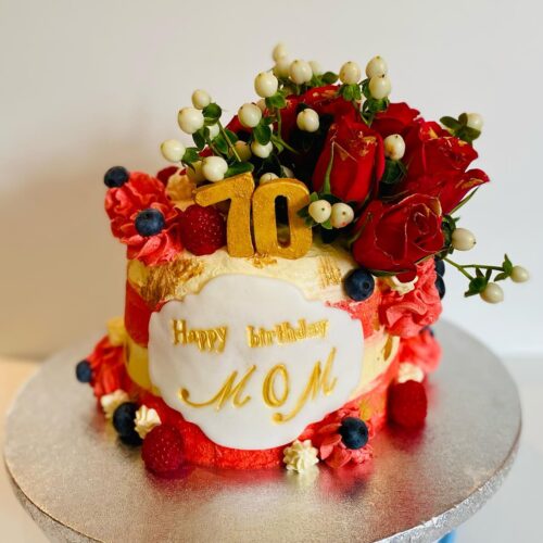 Chocolate Vanilla Sponge Cake decorated with Fresh Buttercream, Fruits and Flowers