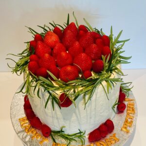 Chocolate cake with Buttercream Layers and Berries Topper