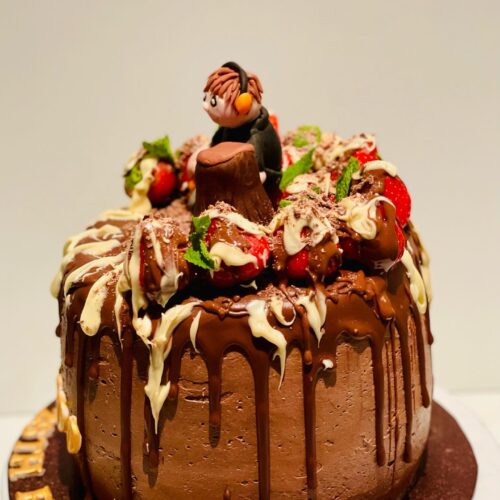 Chocolate Cake with Strawberry  and Tree man Topper