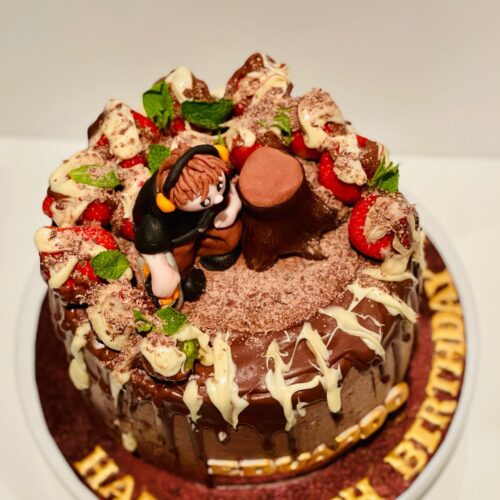 Chocolate Cake with Strawberry  and Tree man Topper