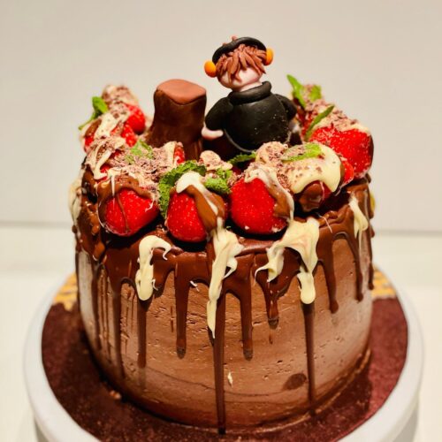 Chocolate Cake with Strawberry  and Tree man Topper