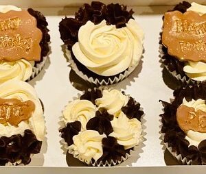 Chocolate Cupcakes with a Mix of Chocolate and Buttercream Toppers