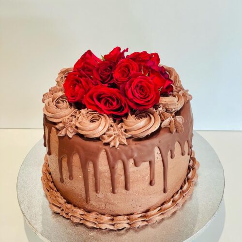 Chocolate Cake with Chocolate drops and Rose Flowers Topper