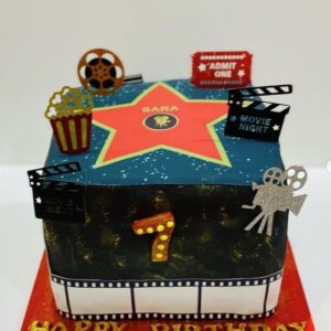 Movie designed Vanilla Buttercream Cake with Strawberries Jam filling