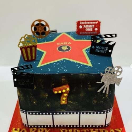 Movie designed Vanilla Buttercream Cake with Strawberries Jam filling