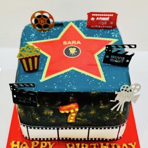 Movie designed Vanilla Buttercream Cake with Strawberries Jam filling